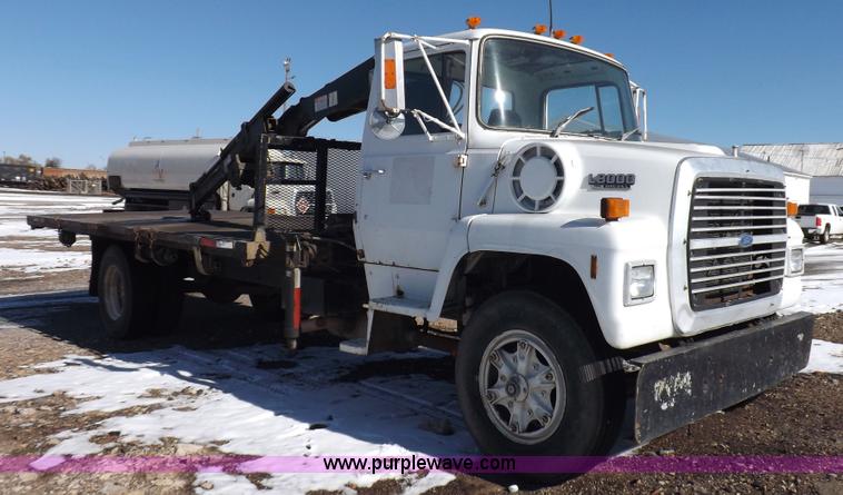 image for item K3032 1987 Ford LN8000 flatbed truck