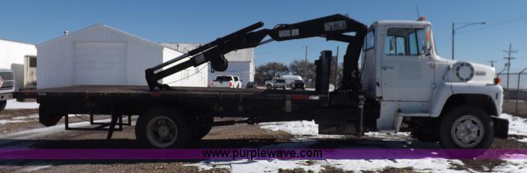 image for item K3032 1987 Ford LN8000 flatbed truck