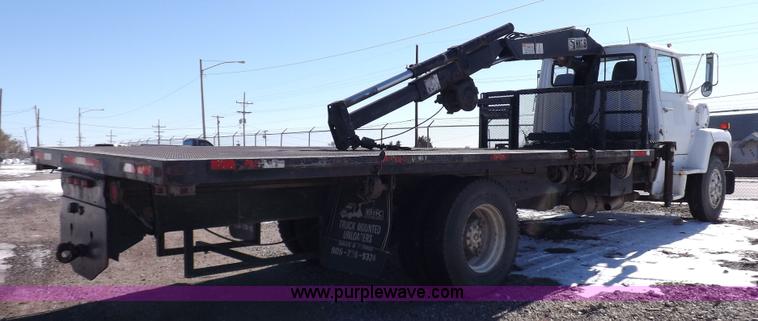 image for item K3032 1987 Ford LN8000 flatbed truck