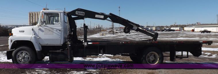 image for item K3032 1987 Ford LN8000 flatbed truck