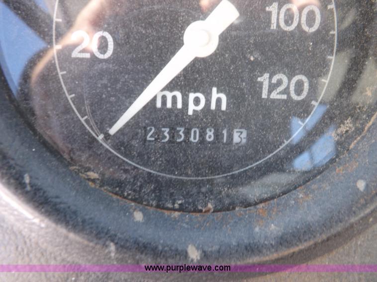 image for item K3032 1987 Ford LN8000 flatbed truck