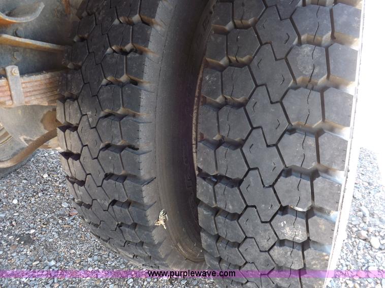 image for item K3032 1987 Ford LN8000 flatbed truck