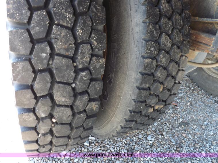 image for item K3032 1987 Ford LN8000 flatbed truck