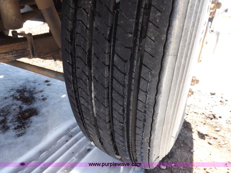 image for item K3032 1987 Ford LN8000 flatbed truck