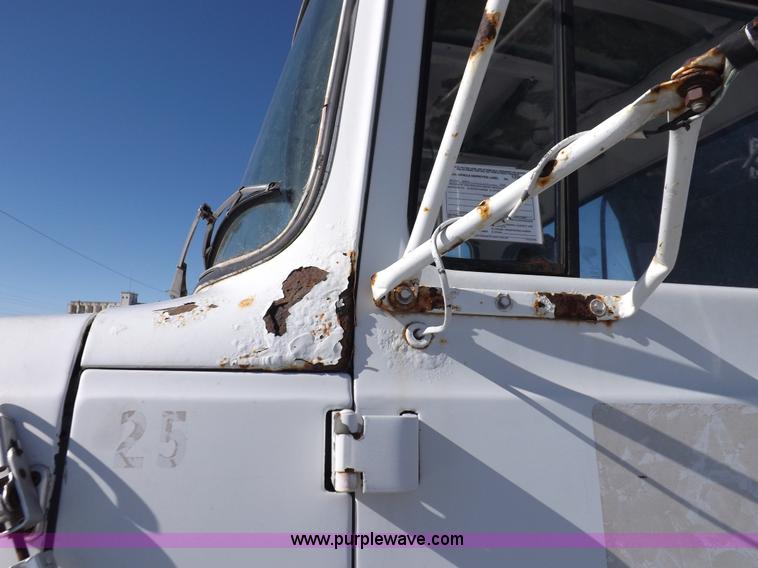 image for item K3032 1987 Ford LN8000 flatbed truck