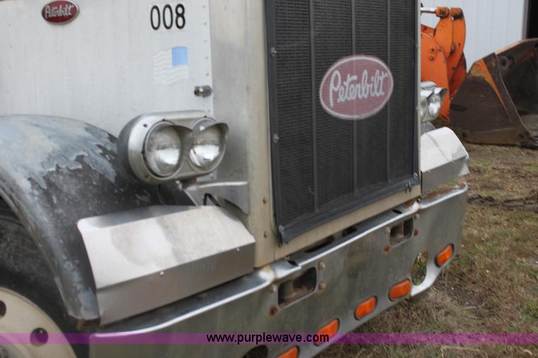 image for item H2016 1983 Peterbilt 359 dump truck