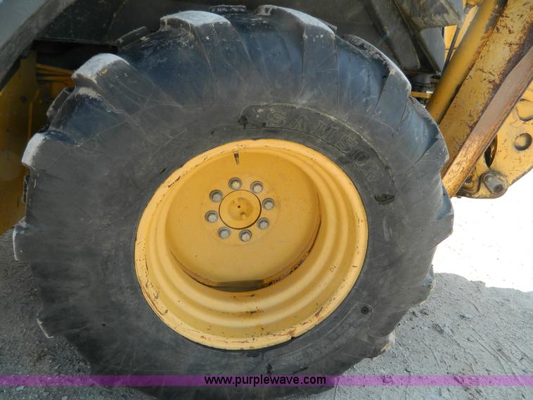 image for item H2358 2002 John Deere 410G backhoe