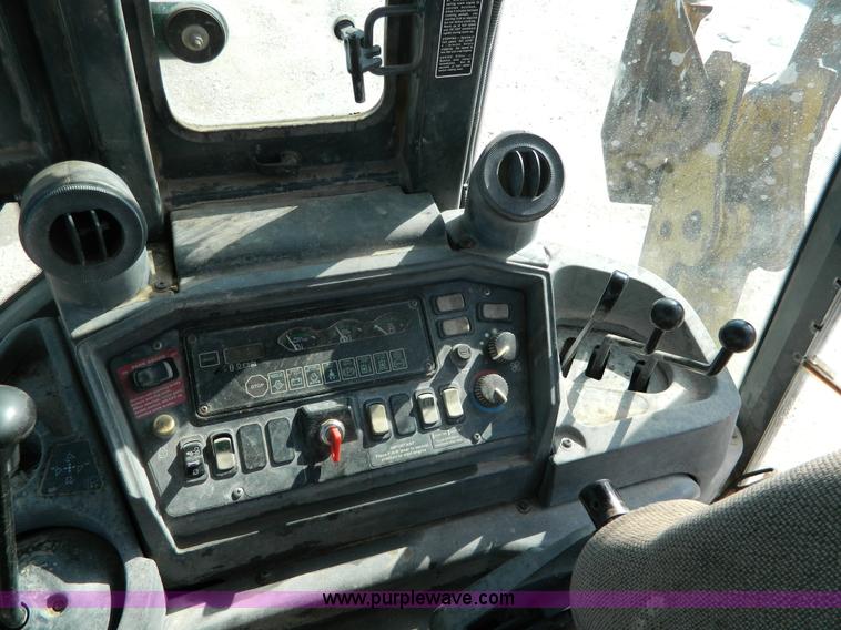 image for item H2358 2002 John Deere 410G backhoe