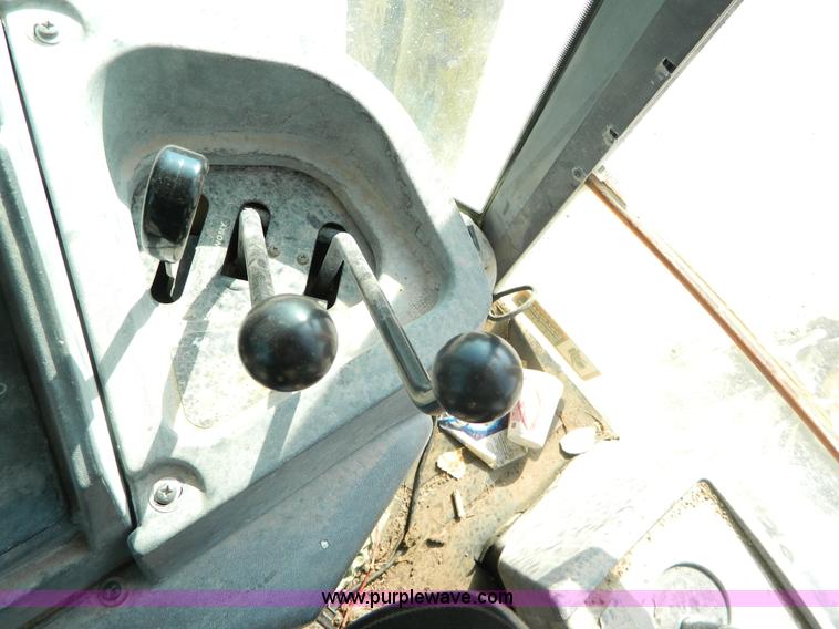 image for item H2358 2002 John Deere 410G backhoe