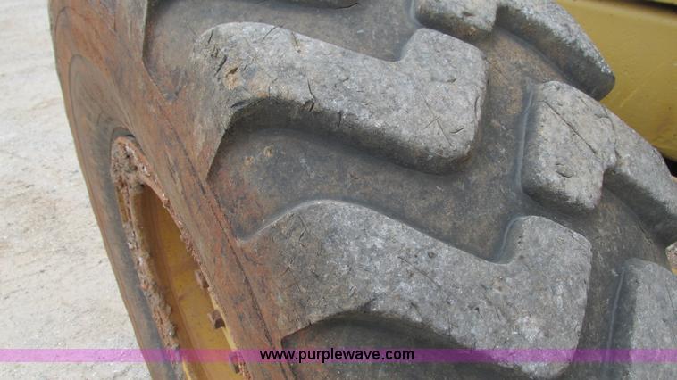 image for item I3167 1995 Caterpillar 12H motor grader