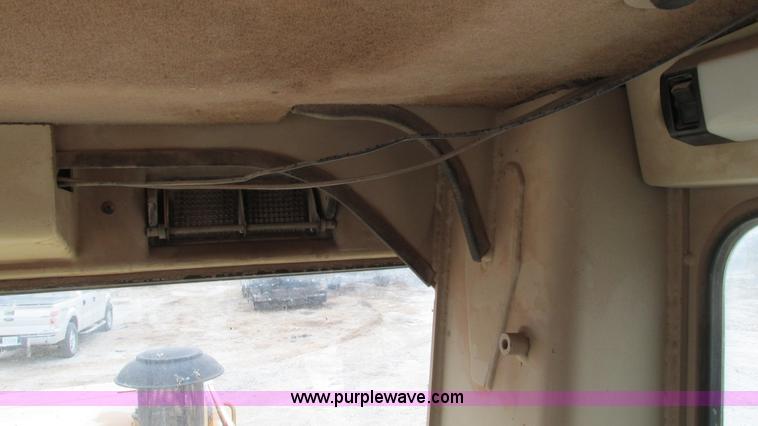 image for item I3167 1995 Caterpillar 12H motor grader