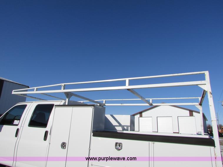 image for item I6712 2009 Chevrolet C5500 Crew Cab service truck