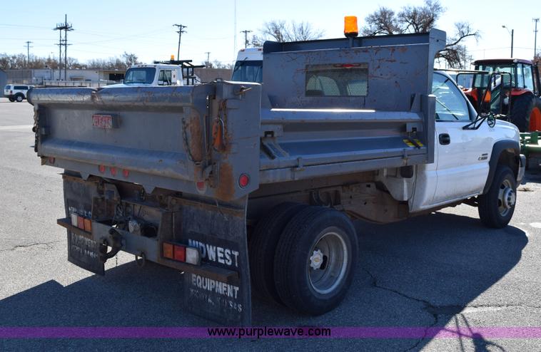 image for item I8619 2004 Chevrolet Silverado 3500 flatbed dump truck