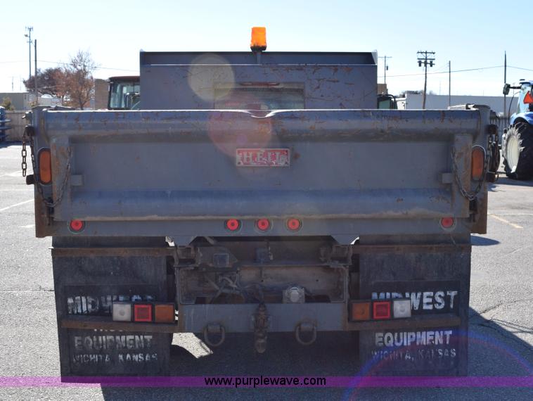 image for item I8619 2004 Chevrolet Silverado 3500 flatbed dump truck