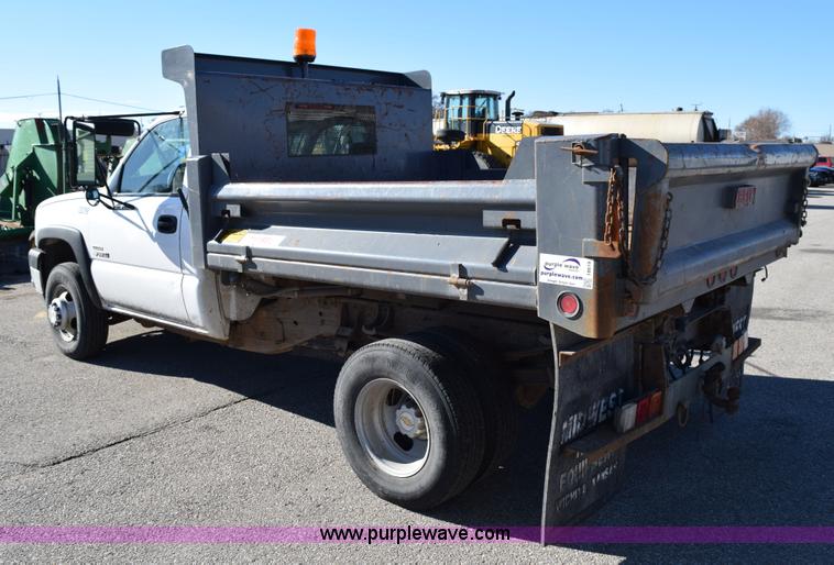 image for item I8619 2004 Chevrolet Silverado 3500 flatbed dump truck