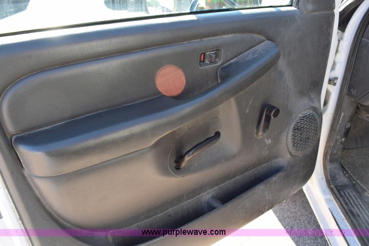 image for item I8619 2004 Chevrolet Silverado 3500 flatbed dump truck