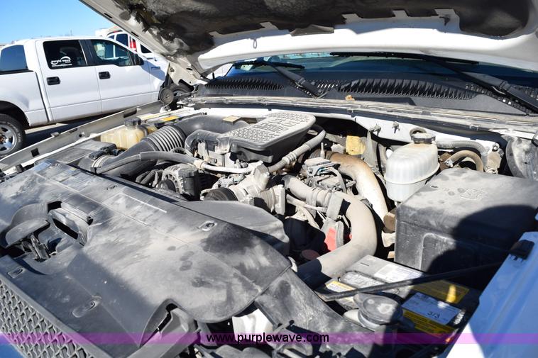 image for item I8619 2004 Chevrolet Silverado 3500 flatbed dump truck