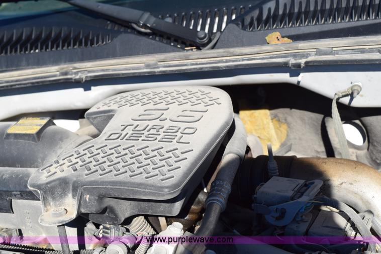 image for item I8619 2004 Chevrolet Silverado 3500 flatbed dump truck