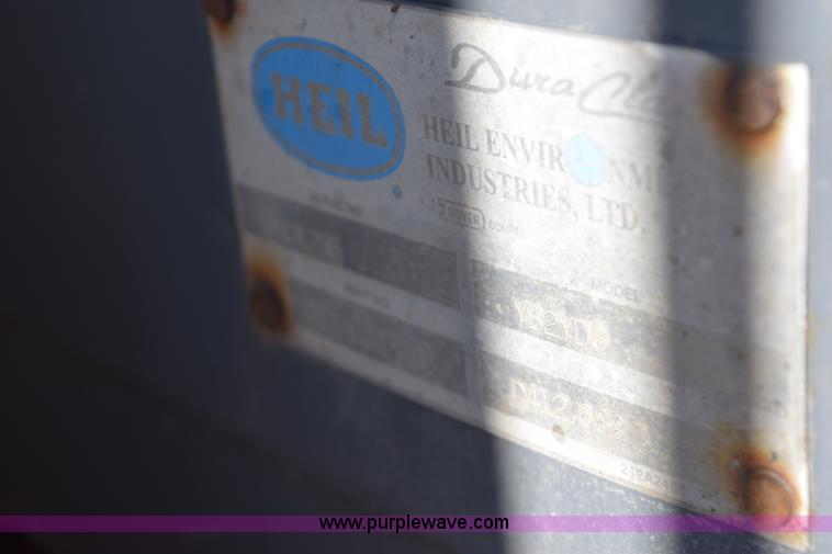 image for item I8619 2004 Chevrolet Silverado 3500 flatbed dump truck