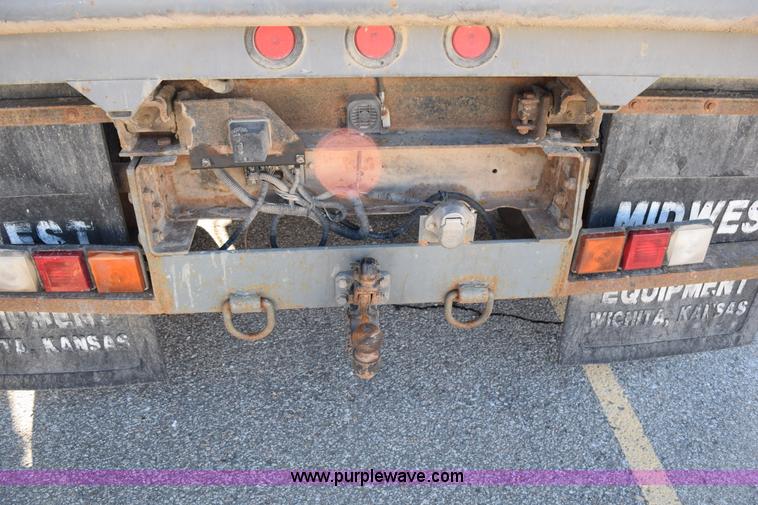 image for item I8619 2004 Chevrolet Silverado 3500 flatbed dump truck