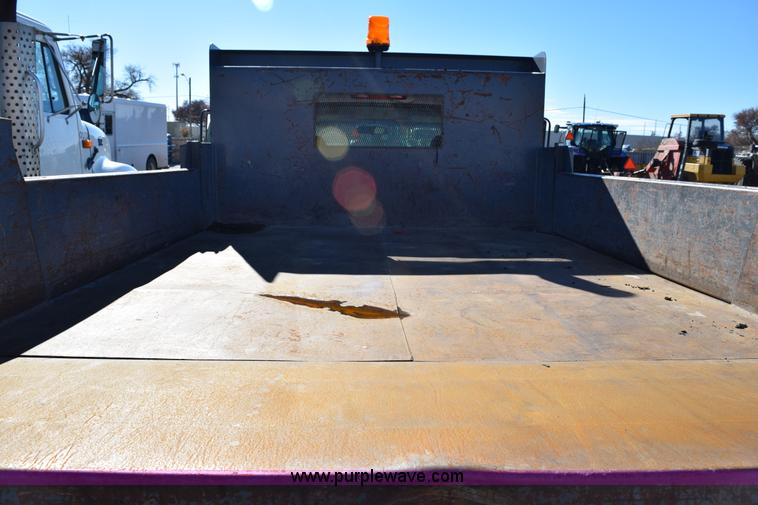 image for item I8619 2004 Chevrolet Silverado 3500 flatbed dump truck