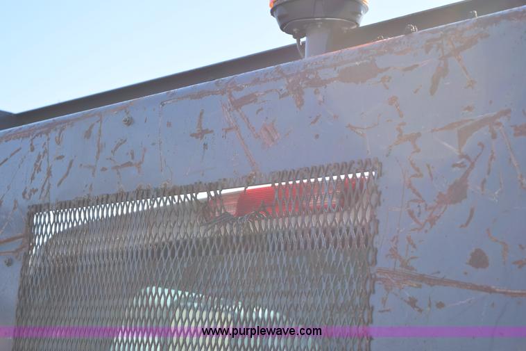 image for item I8619 2004 Chevrolet Silverado 3500 flatbed dump truck