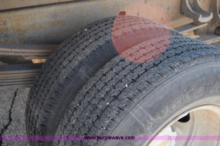 image for item I8619 2004 Chevrolet Silverado 3500 flatbed dump truck