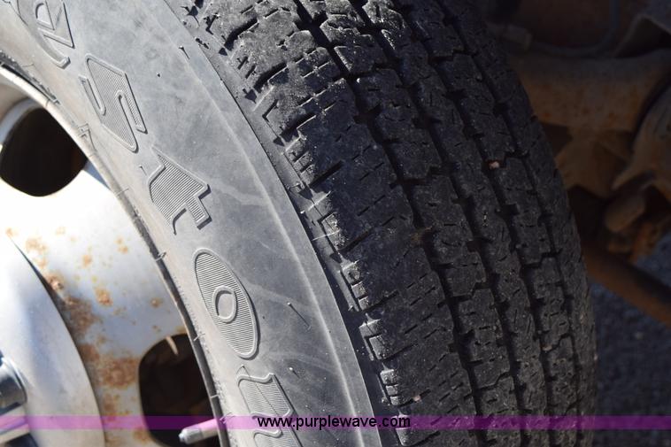 image for item I8619 2004 Chevrolet Silverado 3500 flatbed dump truck