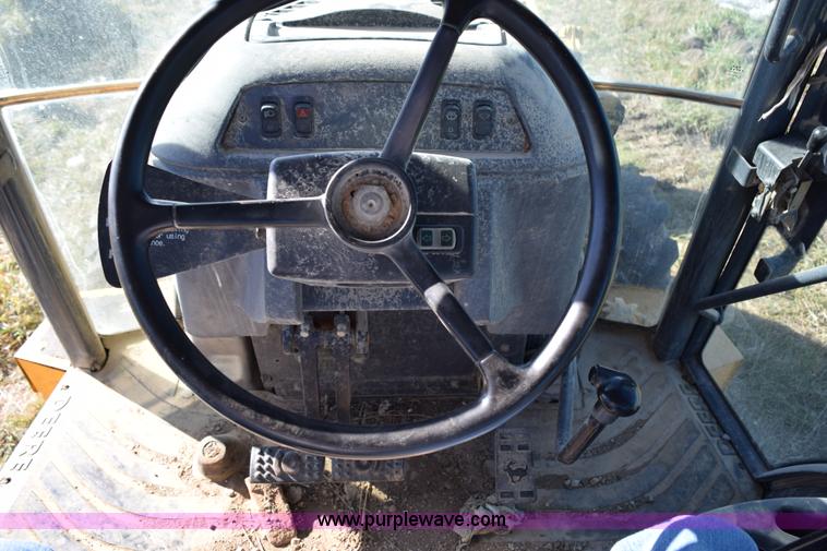 image for item I8674 2001 John Deere 310SG backhoe