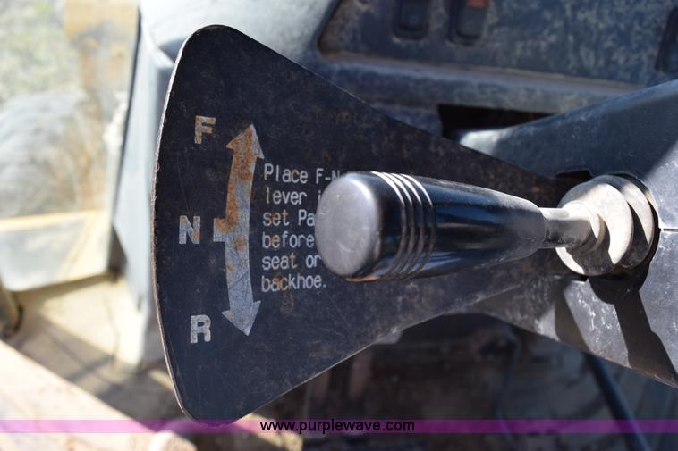 image for item I8674 2001 John Deere 310SG backhoe