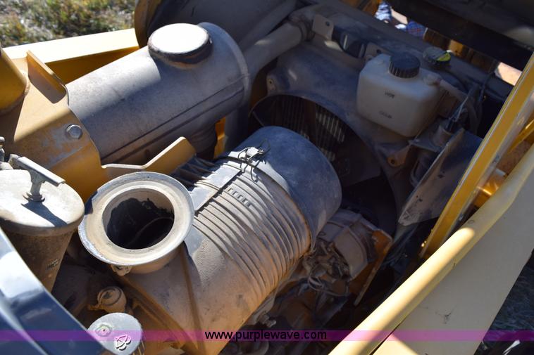 image for item I8674 2001 John Deere 310SG backhoe