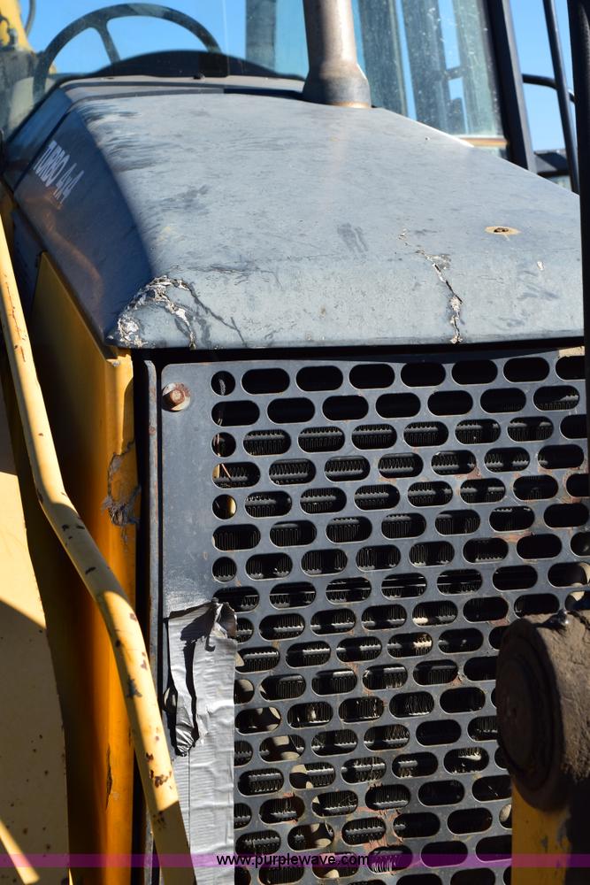 image for item I8674 2001 John Deere 310SG backhoe