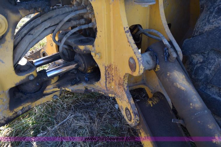 image for item I8674 2001 John Deere 310SG backhoe