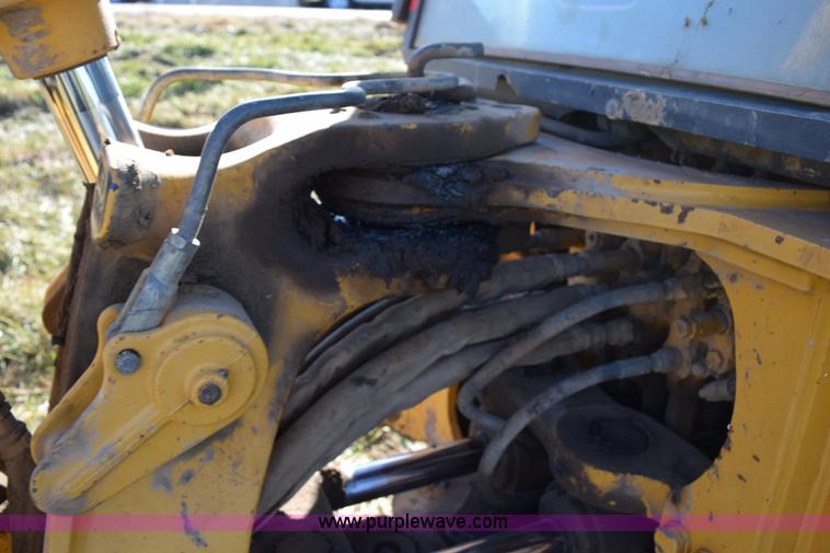image for item I8674 2001 John Deere 310SG backhoe