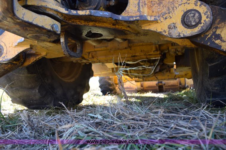 image for item I8674 2001 John Deere 310SG backhoe