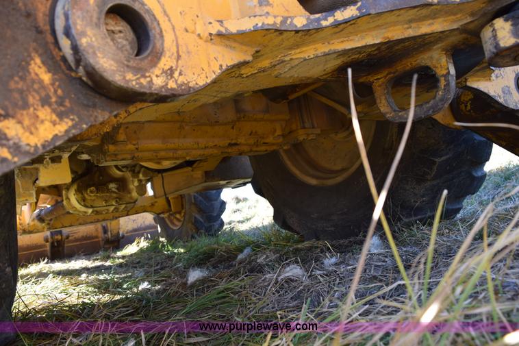 image for item I8674 2001 John Deere 310SG backhoe