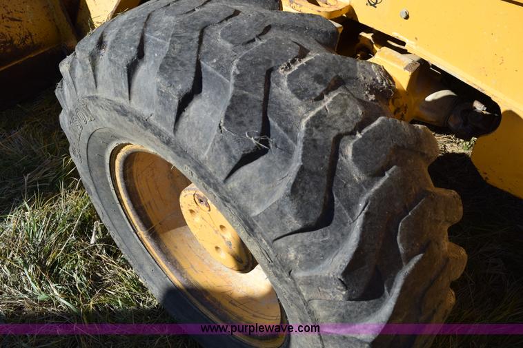 image for item I8674 2001 John Deere 310SG backhoe