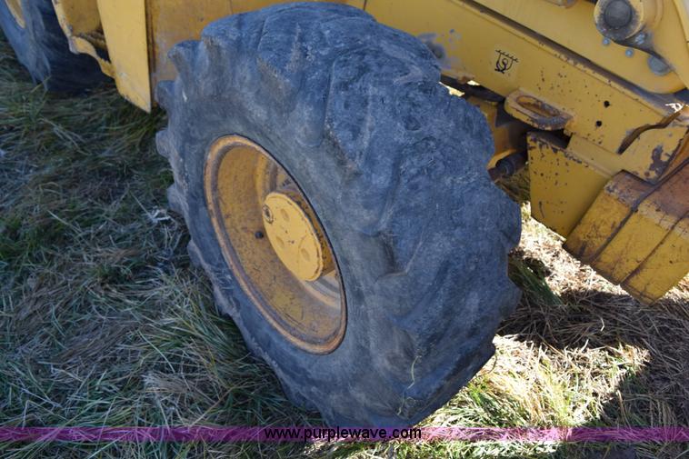 image for item I8674 2001 John Deere 310SG backhoe