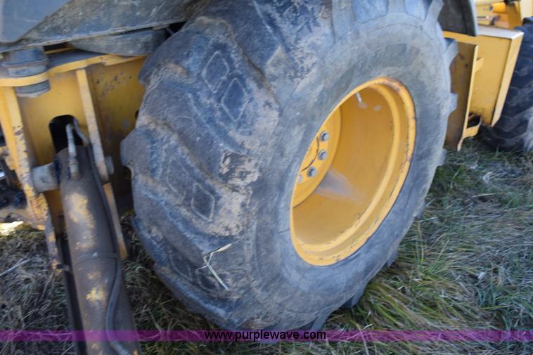 image for item I8674 2001 John Deere 310SG backhoe