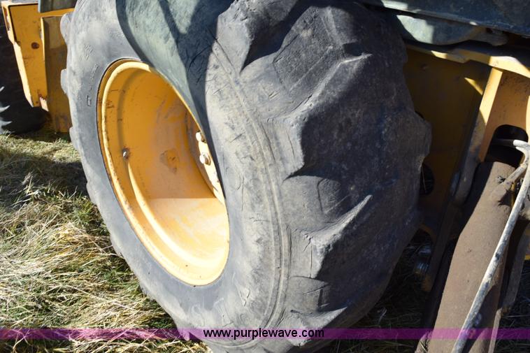 image for item I8674 2001 John Deere 310SG backhoe