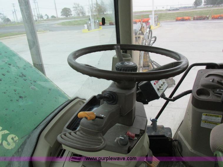 image for item I8840 2004 John Deere 6420 tractor