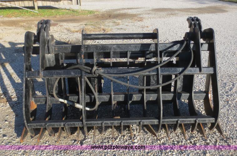 image for item AZ9138 Root rake grapple skid steer attachment
