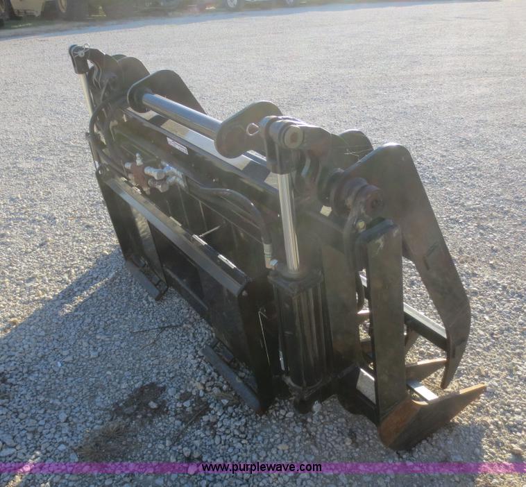 image for item AZ9138 Root rake grapple skid steer attachment