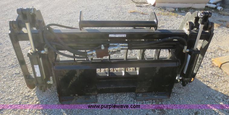 image for item AZ9138 Root rake grapple skid steer attachment