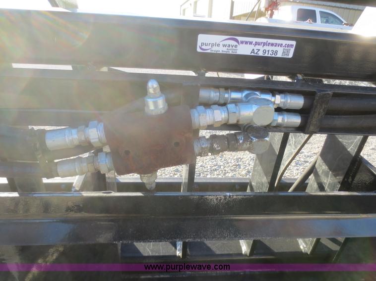 image for item AZ9138 Root rake grapple skid steer attachment