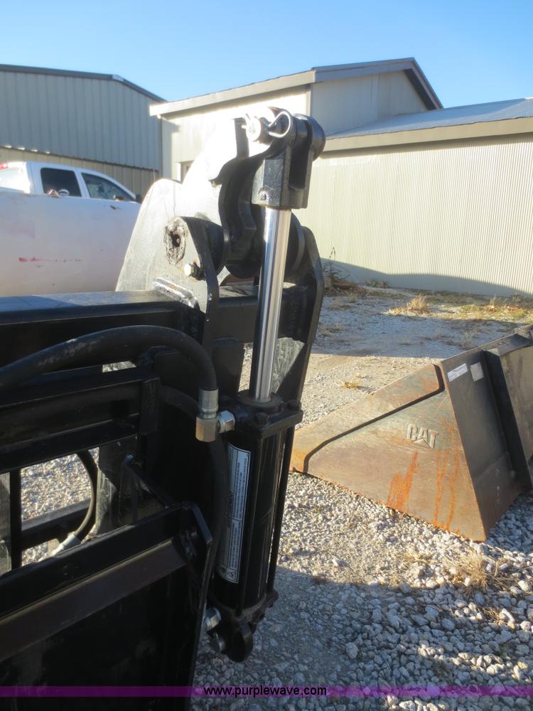 image for item AZ9138 Root rake grapple skid steer attachment