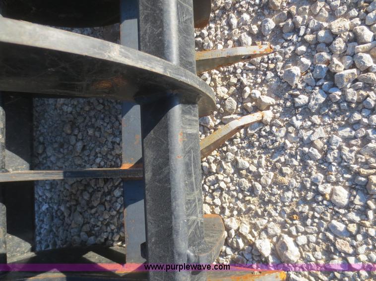 image for item AZ9138 Root rake grapple skid steer attachment