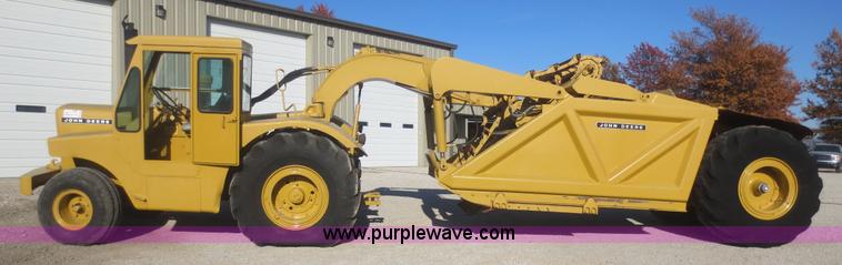 image for item D2208 John Deere 5010 elevating scraper