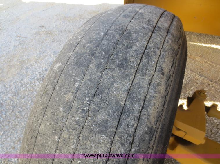 image for item D2208 John Deere 5010 elevating scraper