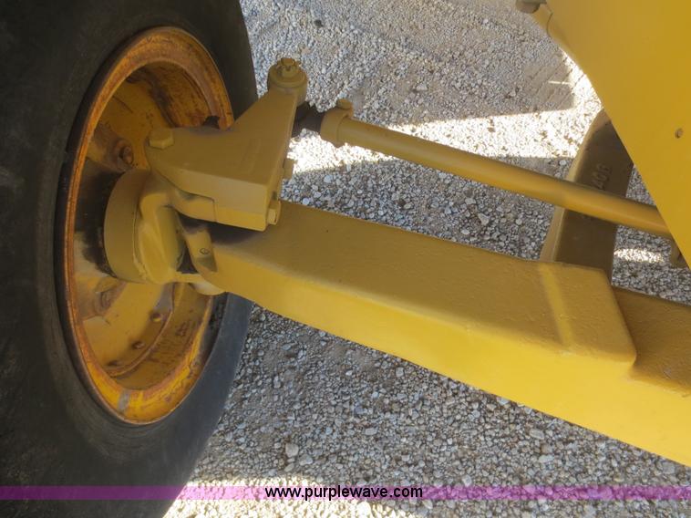 image for item D2208 John Deere 5010 elevating scraper
